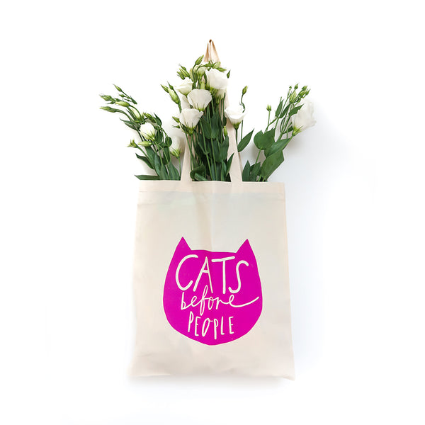Cats before people tote bag