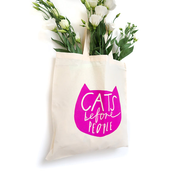 Cats before people tote bag